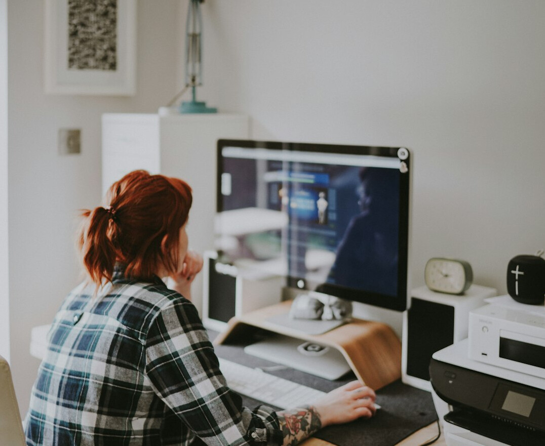 person working remotely on computer